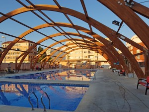 Restauración vigas de madera de una piscina